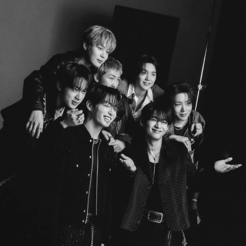 BTS profile picture with elegant stage outfits night background