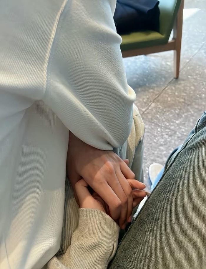 couple hands together dp