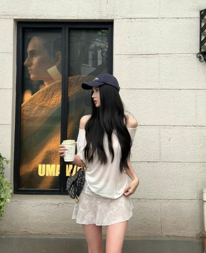 Chill pose cap girl dp simple style