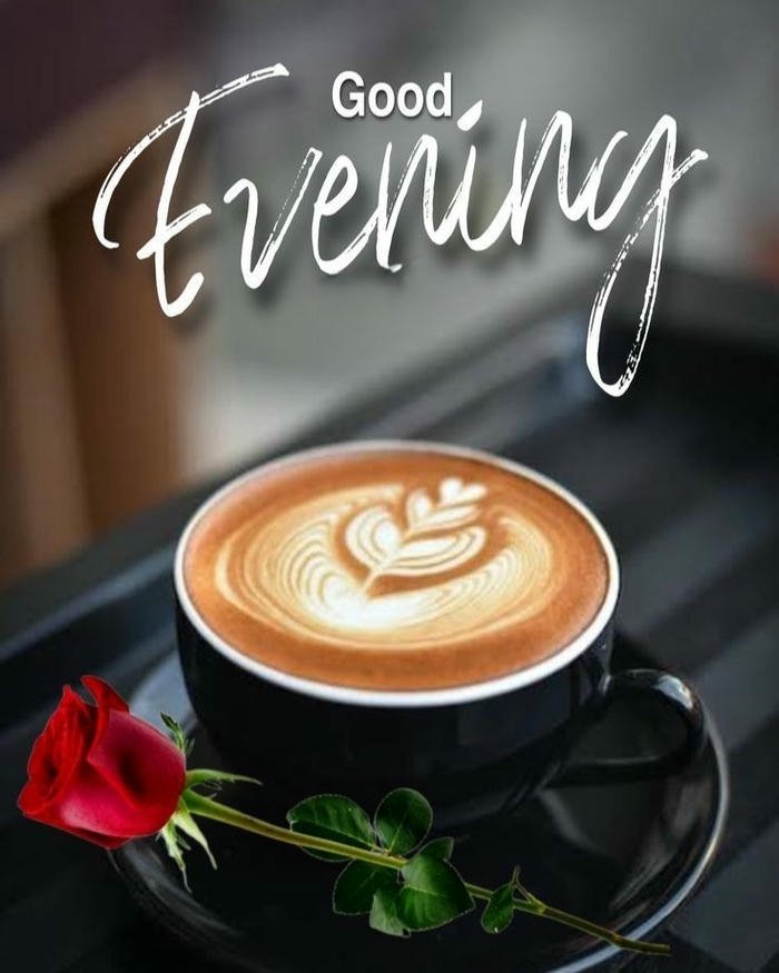 Coffee cup by window rainy evening mood dark view