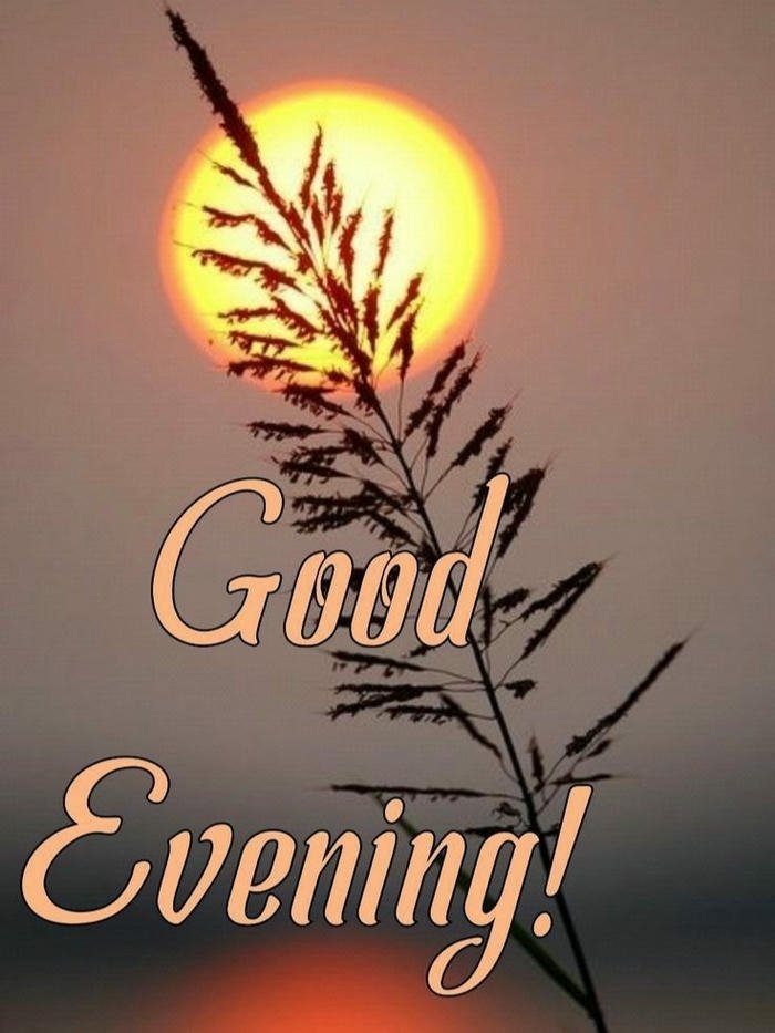 Good evening love image hand silhouette holding light sunset background