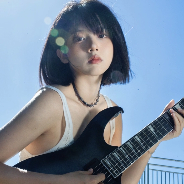 Guitar girl dp featuring relaxed vibe minimalist background scene