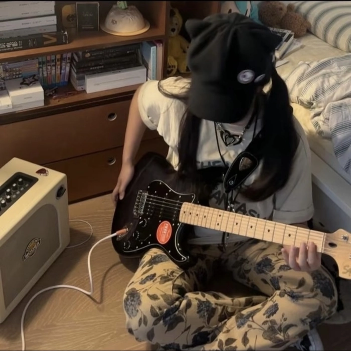 Guitar girl dp showing peaceful mood beside acoustic guitar