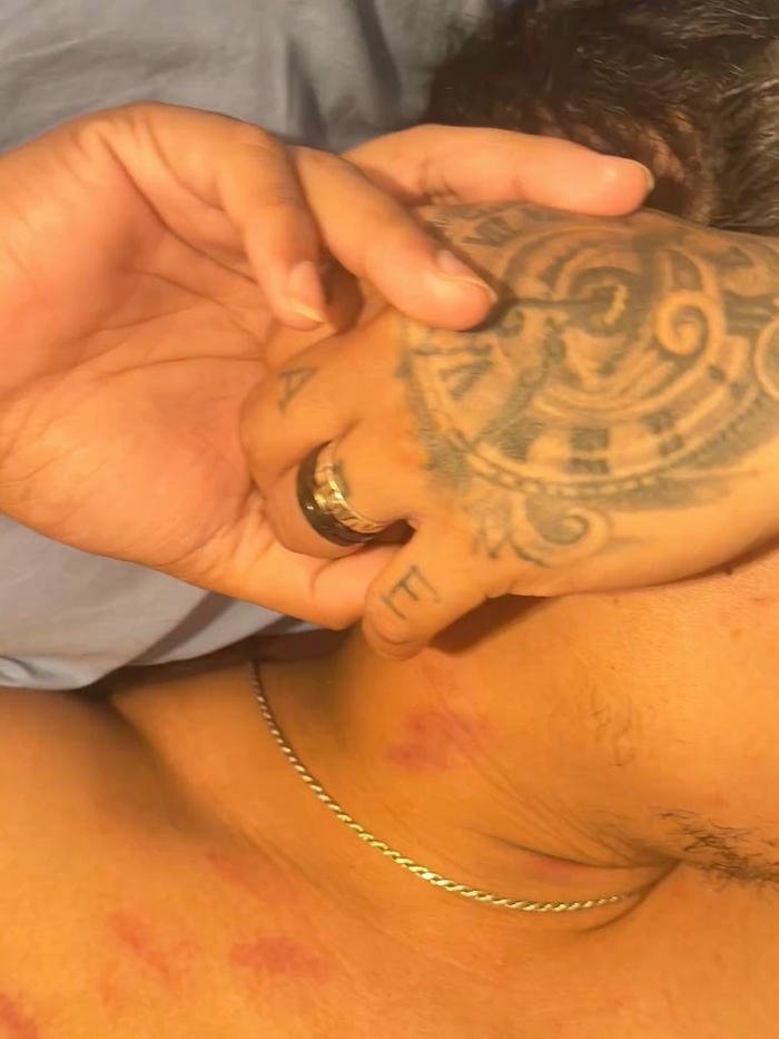 Love bites images man neck tattoo hand holding view