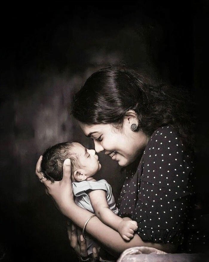 Love maa image black and white photo mother kissing child forehead