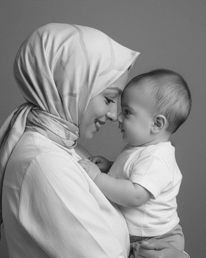 Love maa image grayscale photo mother smiling lovingly at her baby