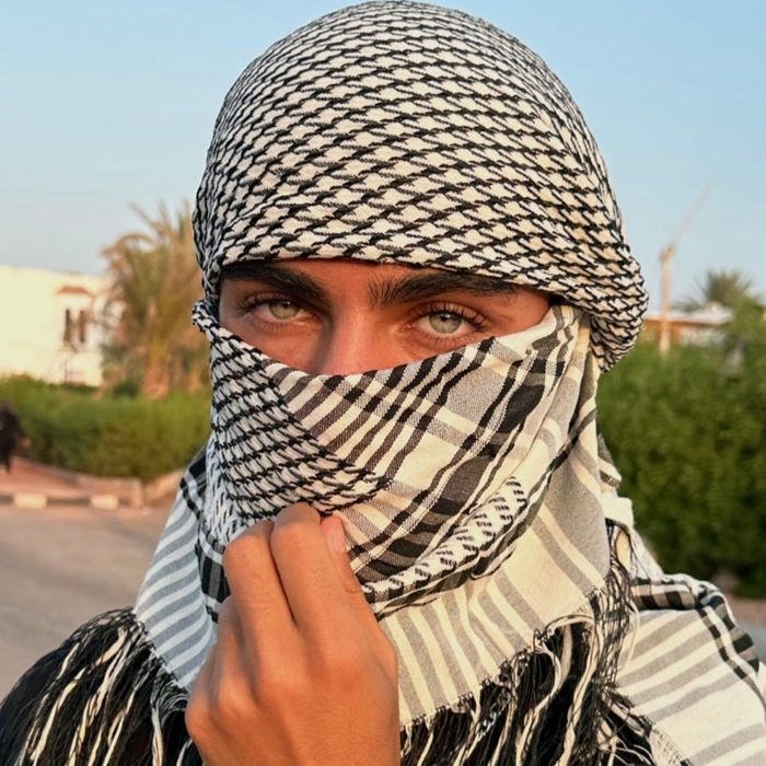 Muslim boys dp close up eyes with checkered scarf