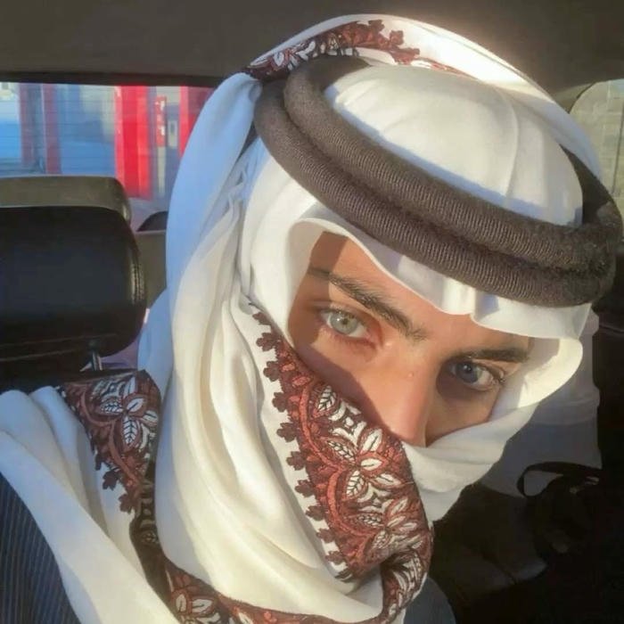 Muslim boys dp guy in car wearing traditional headscarf
