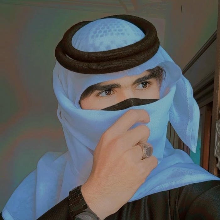 Muslim boys dp man with blue scarf covering face