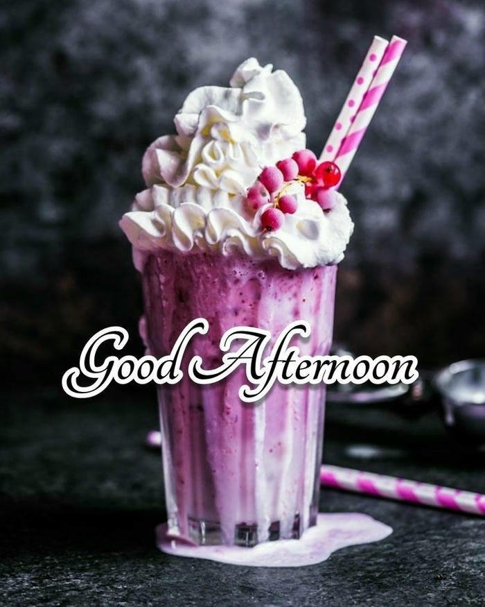 Pink milkshake whipped cream sweet afternoon treat drink view