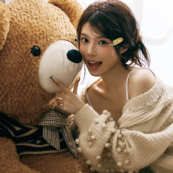 Teddy bear girl dp showing calm mood indoor lighting