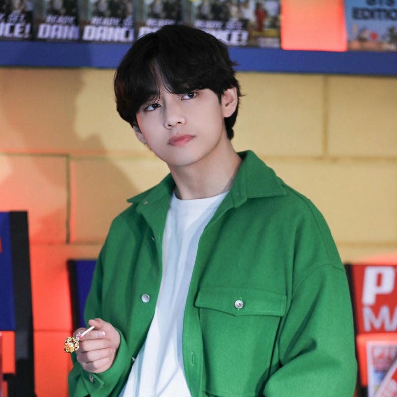 V green jacket looking camera handsome portrait style view