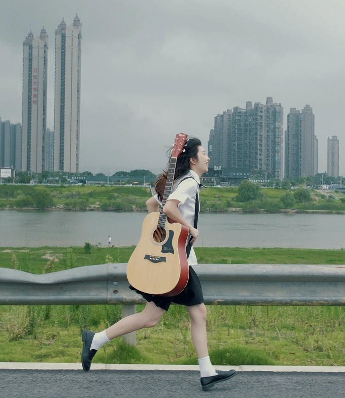 dp guitar girl warm tones cozy vibe