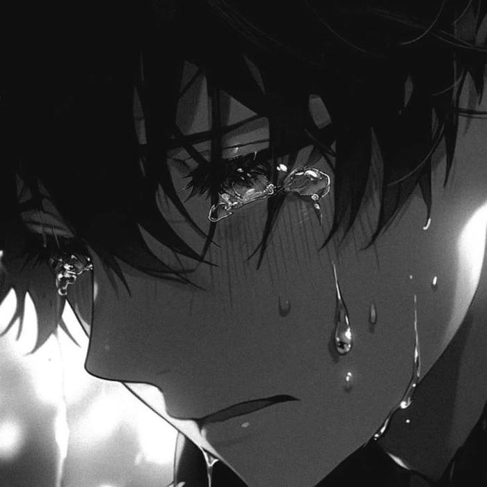 Anime boy crying with tears streaming down face profile
