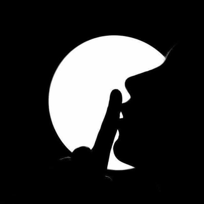 Circle icon silhouette man face finger on lips