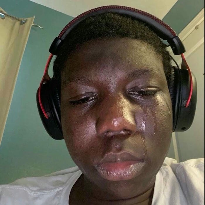 Funny dp for boys guy with headphones looking bored tired