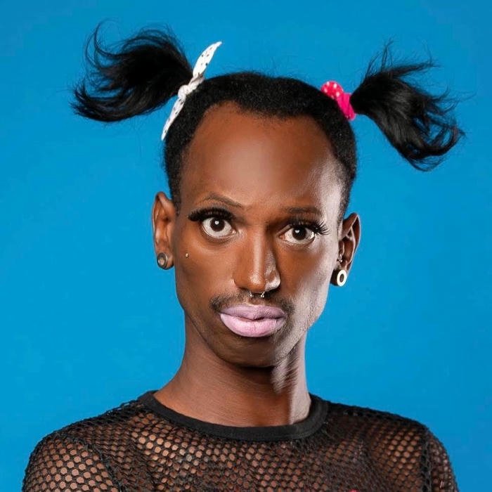 Funny dp for boys man with cute pigtails hairstyle blue