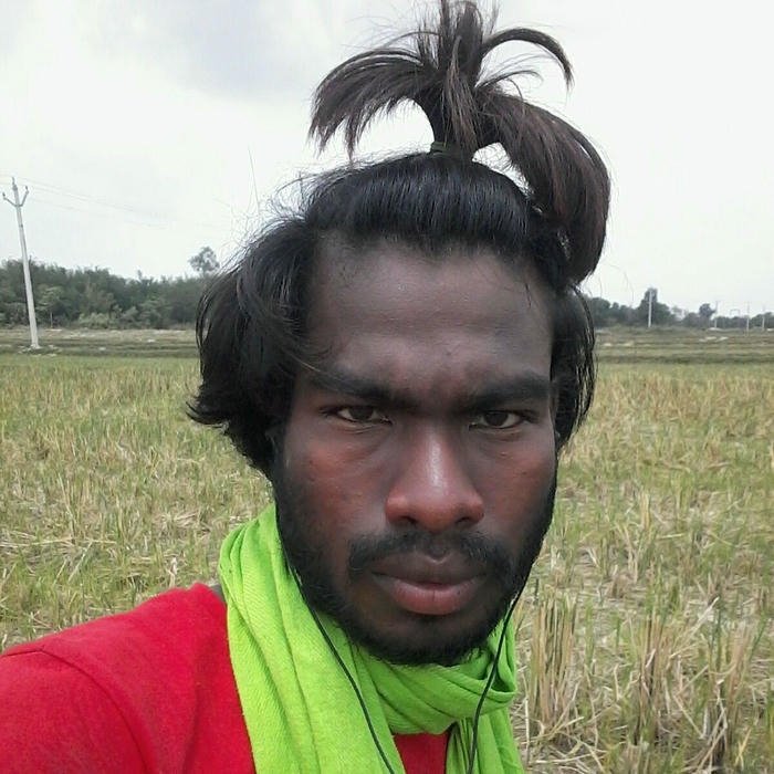 Funny dp for boys man with funny tied up hair
