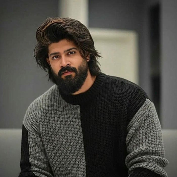 Punjabi boy dp serious man with beard wearing grey sweater