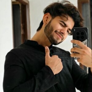 Punjabi boy dp stylish man taking mirror selfie in black