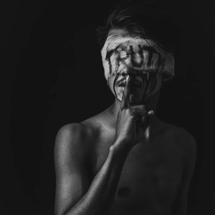 Silent boy dp shirtless man bandaged eyes silence pose