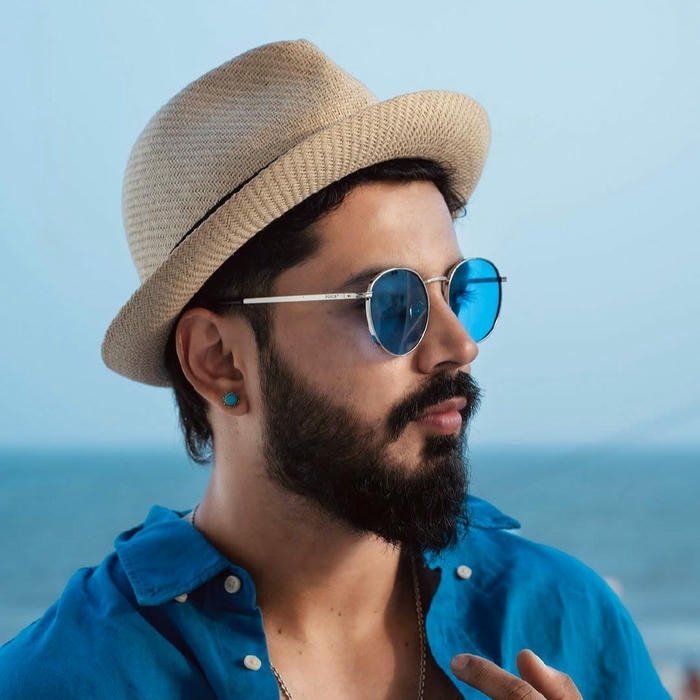 Smart boy dp side profile man hat blue shirt