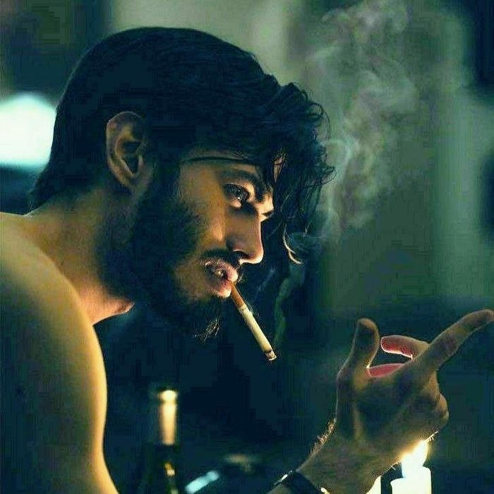 Smoker boy dp side profile man lighting cigarette dark room