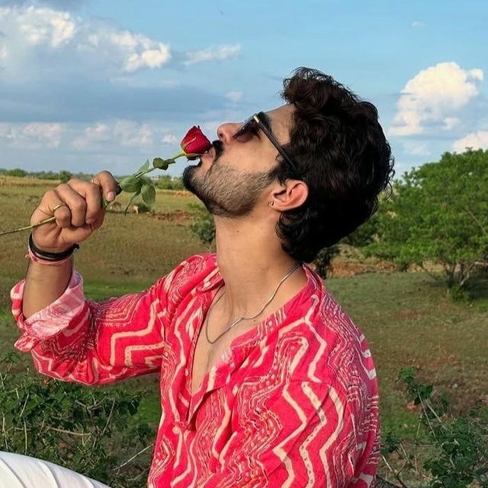 Stylish boy dp download man holding rose looking at sky