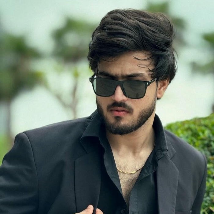 Stylish business man black blazer sunglasses outdoor blurry