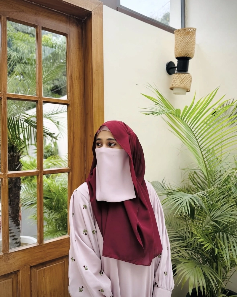 Beautiful Islamic girl DP featuring a calm expression