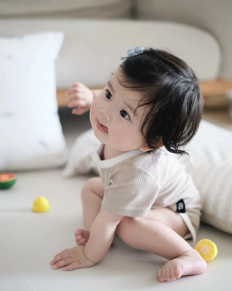 Cute baby girl dp featuring innocent face blurry background