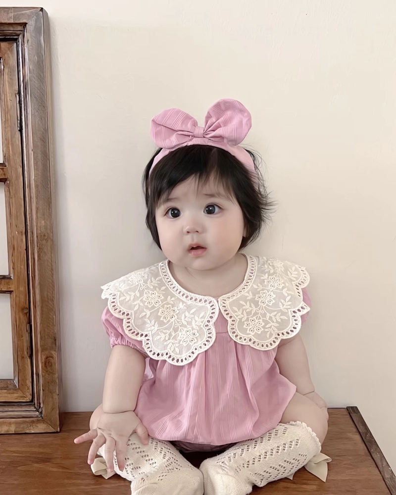 Cute baby girl dp showing playful mood indoor atmosphere