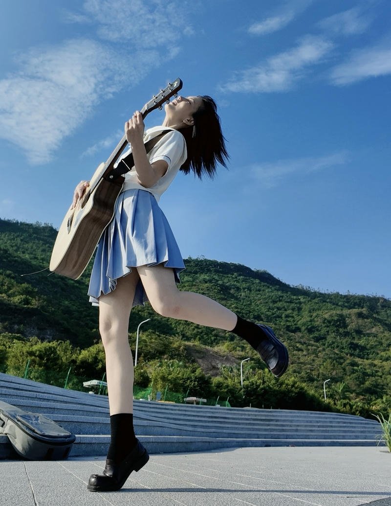 Quiet night girl with guitar dp deep thinking mood