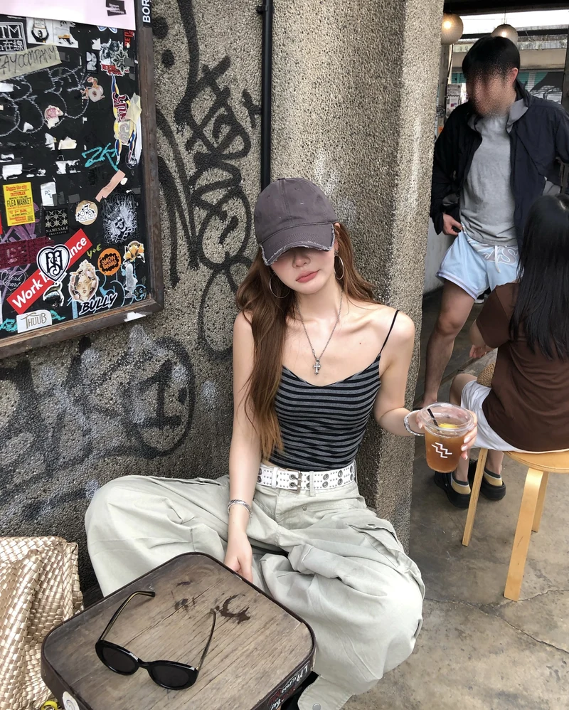 Cap girl dp image stylish casual look with confident attitude