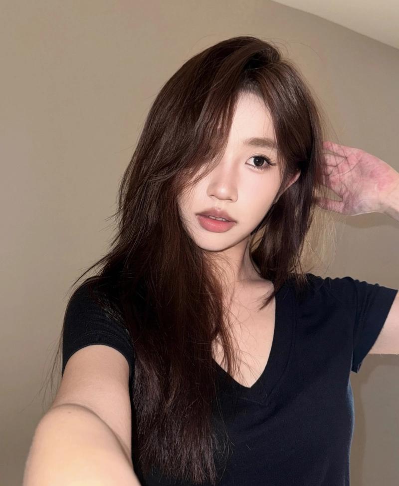 Cute pose half face girl dp playful vibe