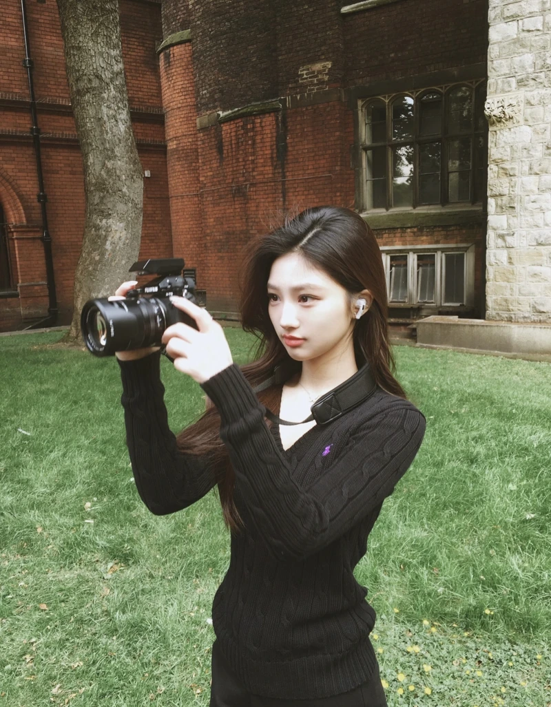 Girls dp with camera confident pose holding lens with bold vibe