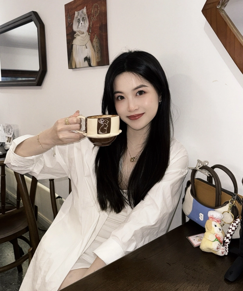 Golden hour coffee moment with calm aesthetic cute girl with coffee cup dp