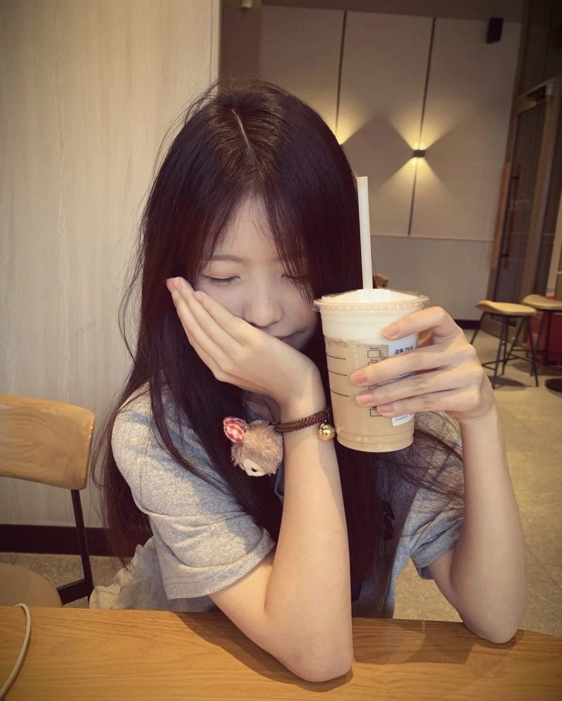 Soft pastel cafe aesthetic with dreamy mood cute girl with coffee cup dp